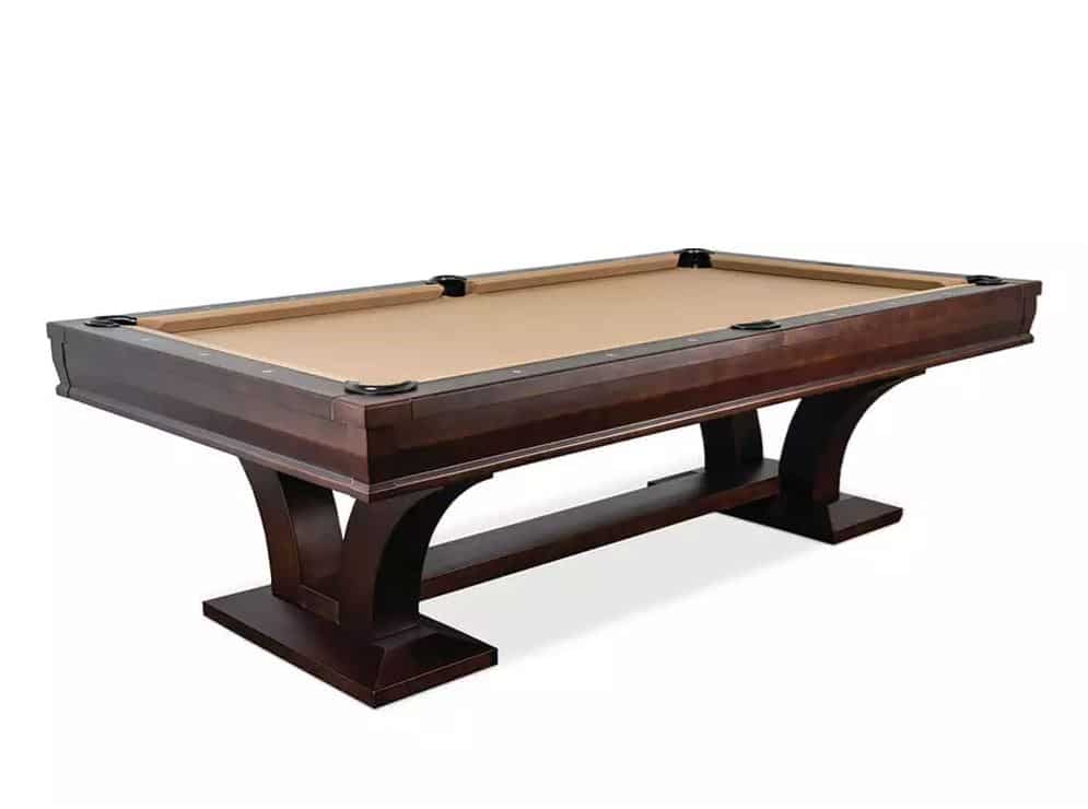 Dark wooden pool/billiards table with tan cloth and four corner pockets, on a white background.